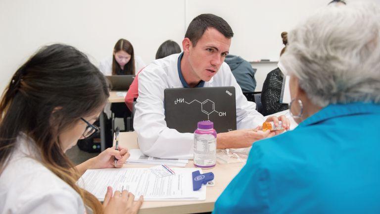  PharmD student at a Medicare Part D Outreach Clinic