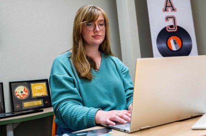 college student with a laptop